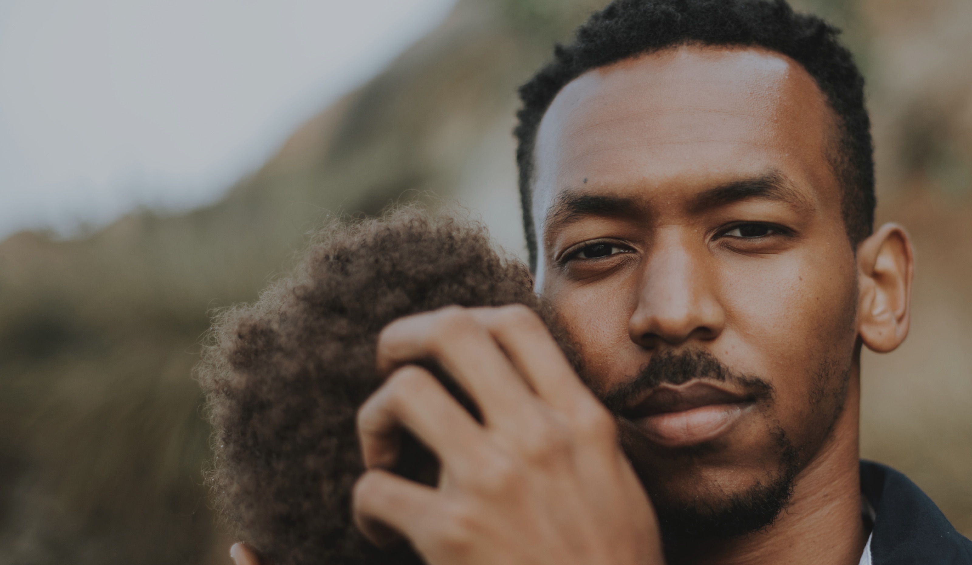 Close up of a man holding his child